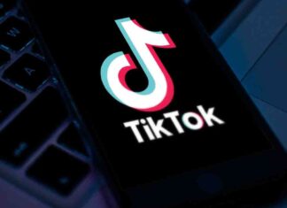 What is TikTok and why is it so popular? TikTok logo on smartphone