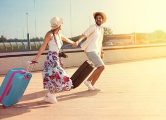 Personality can trump expertise on YouTube A couple with suitcases running and holding hands