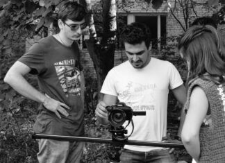 What we can learn from the most liked video on YouTube decorative image of several people, presumably video creators) looking at a camera screen