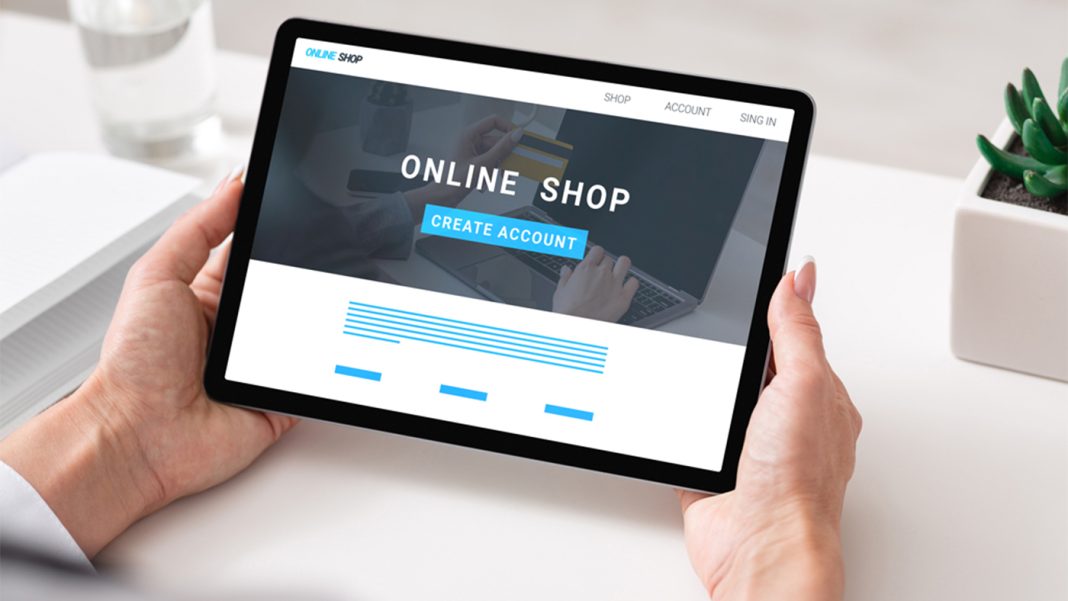 unrecognizable-businesswoman-using-tablet-with-onl-QG38NHU