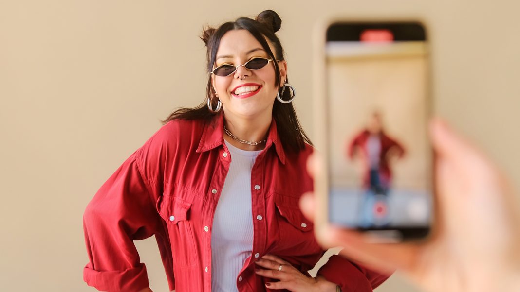 stylish-trendy-woman-recording-dance-video-for-soc-2026-01-06-08-52-02-utc TikTok Shop introduces “Branded Buzz” bonuses for creators featured image